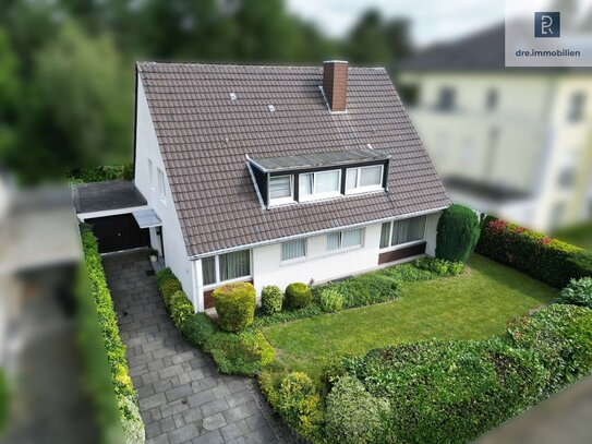 Freistehendes Ein-/Zweifamilienhaus in Köln Junkersdorf mit Garage, Stellplätzen und großem Garten