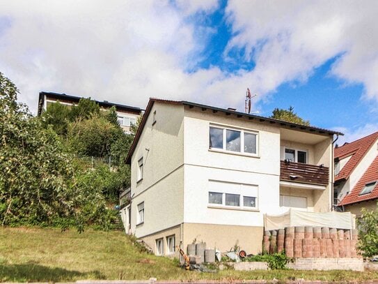 Mehrfamilienhaus mit Garten und Garage in Lomersheim