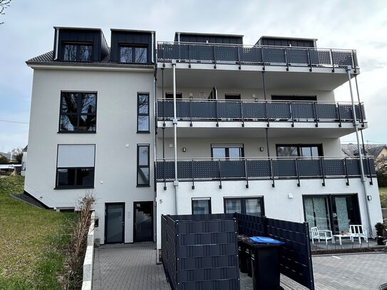 Schön geschnittene Neubauwohnung mit niedrigen Energiekosten in Osburg.