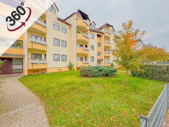 Charmante Dachgeschosswohnung mit 3 Balkonen und Garage in zentraler Lage von Roth - ideal für Paare