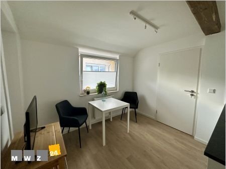 Düsseldorf-Kalkum: 3,5 Zimmer Wohnung, ebenerdige Wohnung in einem Cottage in ruhiger grüner