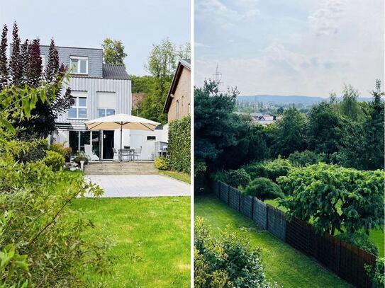 Moderne Doppelhaushälfte im Splitlevel-Stil: Architektur mit Charme auf Sonnengrund in Aachen-Haaren