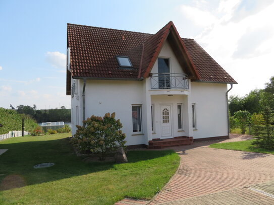 modernes Einfamilienhaus auf großzügigem Grundstück mit Südhanglage und Seeblick