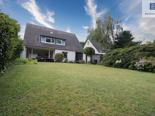 Freistehendes Ein-/Zweifamilienhaus in Köln-Junkersdorf mit Garage, Stellplätzen und großem Garten