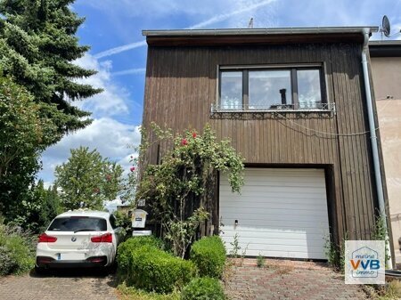 Einfamilienhaus mit Garten und Garage in ruhiger Lage von Mettlach-Weiten