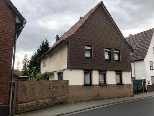 Baugrundstück mit Genehmigung für einen Umbau in ein 2-Fam-Haus und Errichtung eines Doppelhauses auf dem schönen hinte…