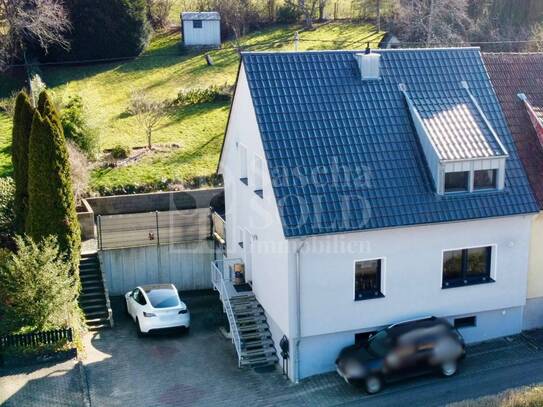 Gepflegte Doppelhaushälfte mit Terrasse und Garten in Heusweiler - Holz