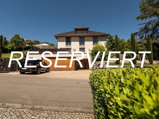 Bezugsfreies Einfamilienhaus mit Traum-Seeblick und großem Grundstück in bevorzugter Südhanglage!