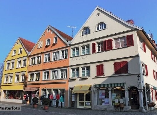 Wohn- und Geschäftshaus mit Anbau und Schuppen