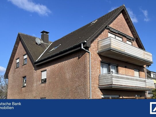 Praktisch geschnittene Eigentumswohnung: Einbauküche, Balkon, Keller, Garage.