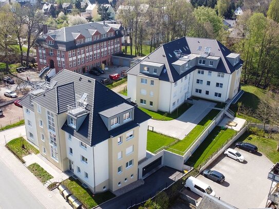 Geschmackvolle Dachgeschosswohnung über zwei Etagen mit TG in bester Wohnlage *Nahe Tierpark*