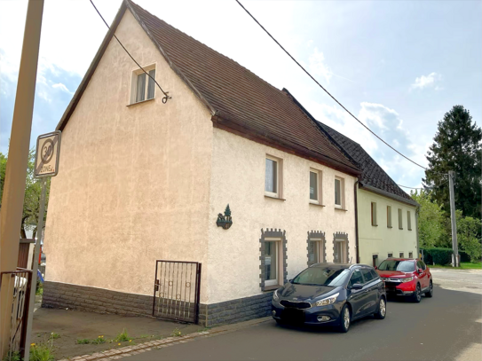 Charmantes Einfamilienhaus mit Doppelgarage in Wildenfels - Ihr neues Zuhause wartet!