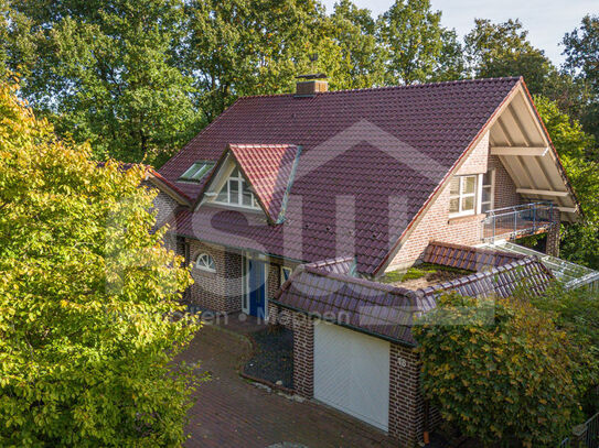 Hochwertiges Einfamilienhaus nebst Spitzdachgarage und Wintergarten mit freiem Feldblick!