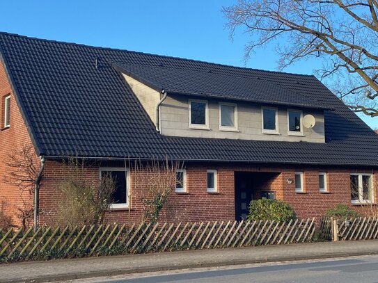 2-Zi EG-Wohnung mit eigenem Garten und Terrasse + Garage und Stellplatz