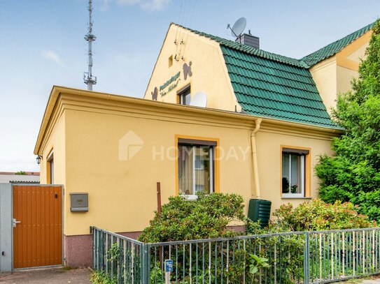 DHH auf gr. Grundstück mit Terrasse und Garage | ZFH möglich | 2 Tageslichtbäder | Guter Zustand