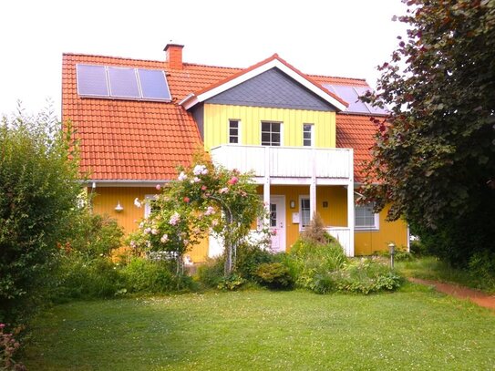 Einfamilienhaus im skandinavischen Landhausstil mit großer Ausbaureserve