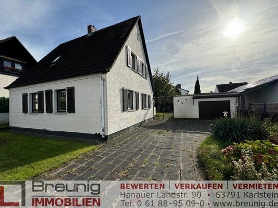 Renovierungsbedürftiges, freistehendes EFH mit großzügigem Grundstück & Garage in zentraler Lage