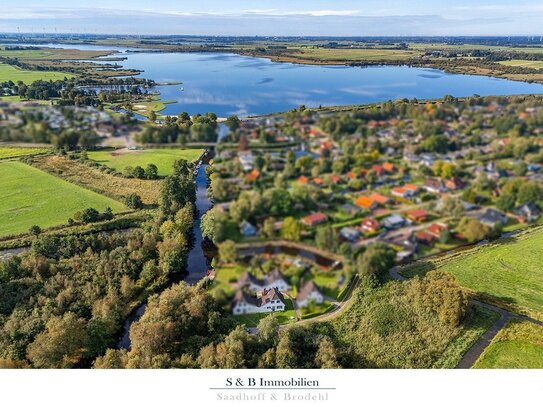 Eigentumsgrundstück - Gepflegtes Ferienhaus am großen Meer