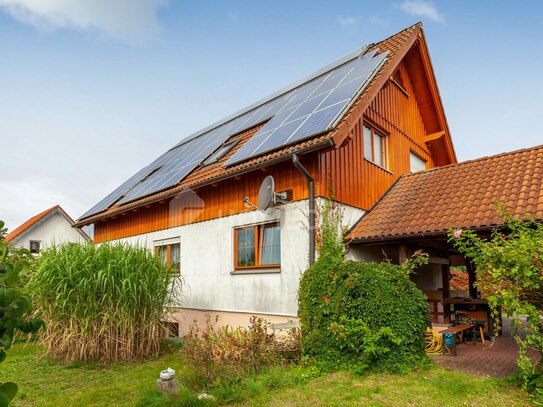 Wohnen wie in einem Eigenheim, 3-Zimmer-Wohnung mit ELW im Souterrain, Garten, Garage und Carport