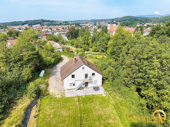 Großzügiges Baugrundstück mit hervorragender Aussicht - mit Bestandsimmobilie zu verkaufen.