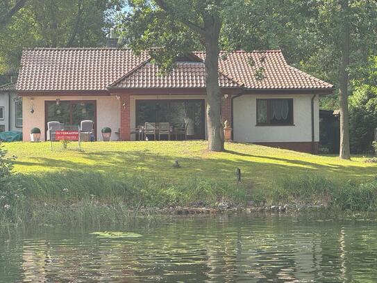 Einfamilienhaus bzw.Bungalow Marienwerder Marienhafen- Wohnen direkt am Wasser