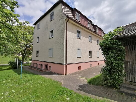 Helle Erdgeschosswohnung mit Ausblick in den parkähnlichen Garten mit großem Schuppenabteil im Garten und Garage!