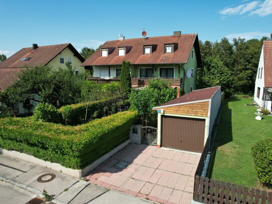 Charmante Doppelhaushälfte mit großzügigem Garten. Begehrte Siedlung - Familienidylle Hallbergmoos