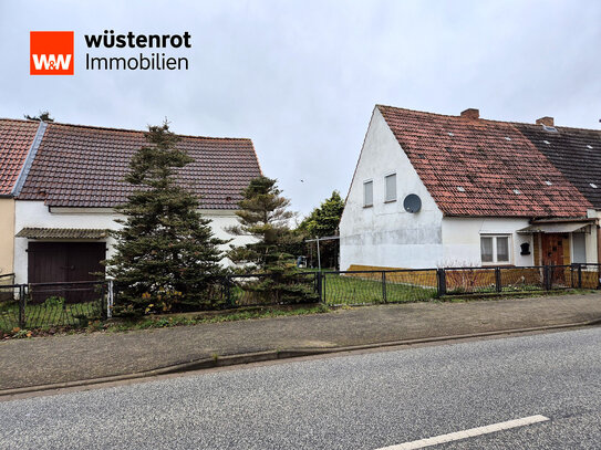 Haushälfte mit viel Land, Stall und Garage in Hohen Pritz