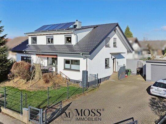 Modernisiertes, effizientes Zweifamilienhaus in ruhiger Lage mit großzügigem Garten und Doppelgarage