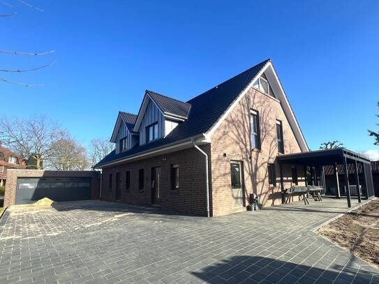 Erstbezug! Attraktive Doppelhaushälfte mit Garten und Carport in Siedlungslage von Bad Zwischenahn