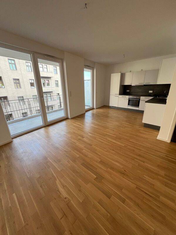 Moderne 4-Zimmerwohnung mit Balkon, Einbauküche und Parkett - Foto 1