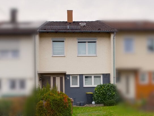 Gepflegtes Reihenhaus mit kleinem Garten und Garage in begehrter Lage