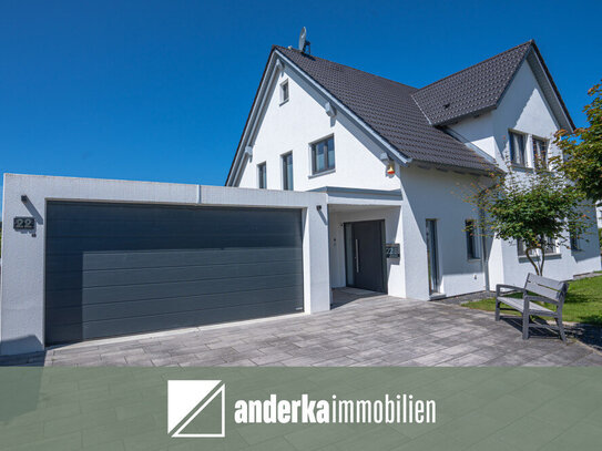 Familienidylle pur: Traumhaus in grüner Umgebung mit KFW 40+ Energiestandard.