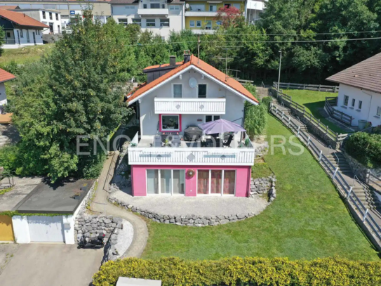 Charmantes Einfamilienhaus in Hanglage mit Blick ins Grüne