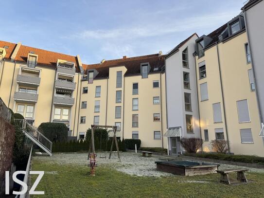 Moderne 3-Zimmer-Wohnung in familienfreundlicher Lage mit Balkon und Tiefgaragenstellplatz