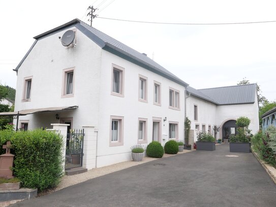 Idyllisches und schön modernisiertes Bauernhaus mit großem Ausbaupotential und gepflegtem Garten