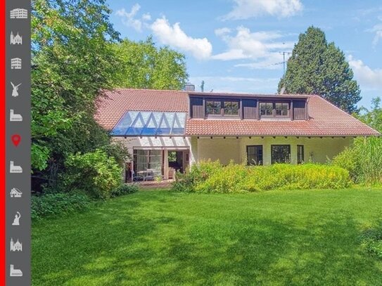 Einfamilienhaus auf ca. 1.150 m² großem Grundstück, ca. 244 m² Wohnfläche und Doppelgarage