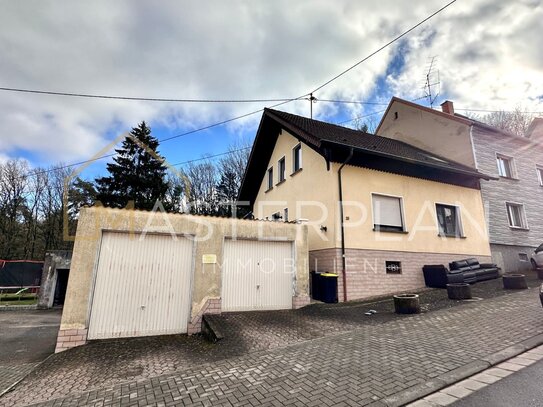 Doppelhaushälfte in Ludweiler - Ihr neues Zuhause mit Wintergarten