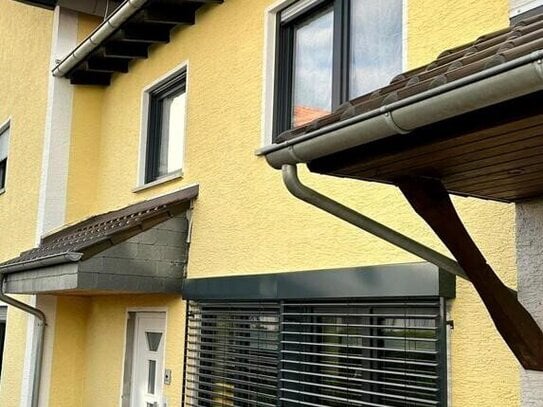 Schicke Maisonette-Wohnung mit Garten in zentraler Lage