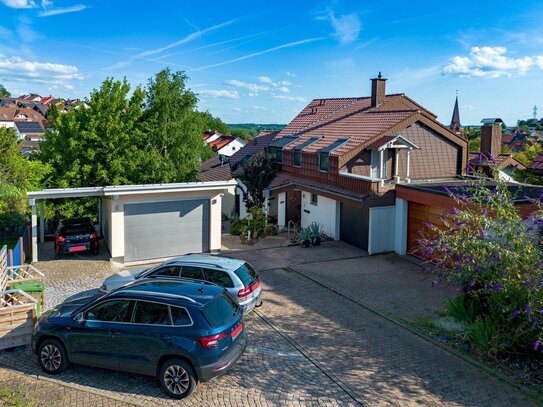 Großzügiges Einfamilienhaus (HH) mit Einliegerwohnung (NH) in ruhiger Lage