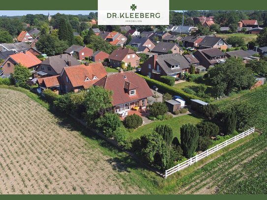 Einfamilienhaus mit Einliegerwohnung und Traumgarten in ruhiger Feldrandlage von Gimbte