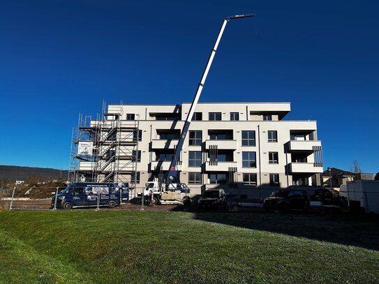 Dreizimmerwohnung mit Dachterrasse und zwei TG-Stellplätze im klimafreundlichen Neubau!