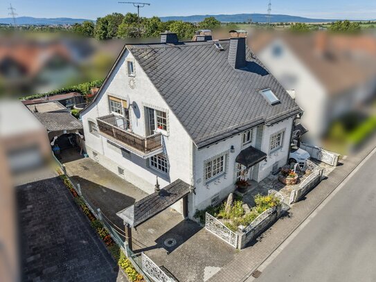 Zentral und ruhig gelegen - 2-Familienhaus mit geschütztem Garten