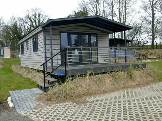 Möbliertes Ferienhaus mit Sonnenterrasse auf Pachtgrund in Scharbeutz nahe Ostsee