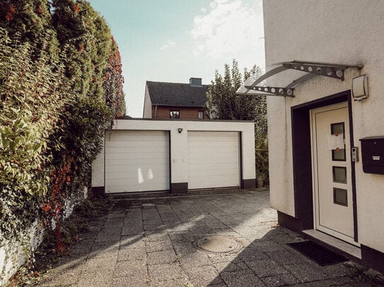 Erdgeschosswohnung mit eigenem Eingang, Garage & kleiner Terrasse in - Kaarst