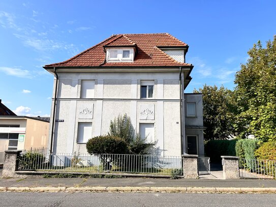 Mehrfamilienwohnhaus mit Ausbaupotential und großem Grundstück in Innenstadtlage