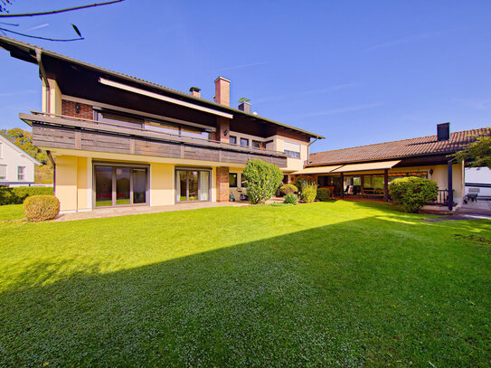 Moderne 7-Zimmer-Erdgeschosswohnung mit Garten