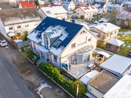 Zweifamilienhaus mit Apartment in Dutenhofen