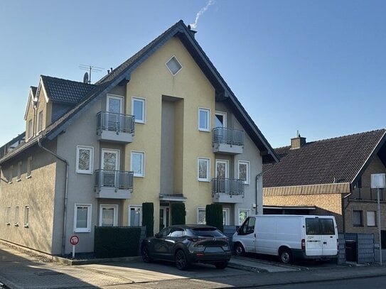 Der Rhein nur einen Katzensprung entfernt: DG-WHG mit Sonnenbalkon in Top-Lage Niederkassel-Mondorf!