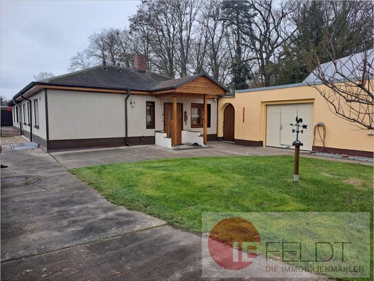 Moderne & gepflegte Doppelhaushälfte im Bungalow-Stil mit Garage, schönem Garten und Werkstatt